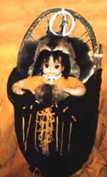 Indian baby doll in cradle board